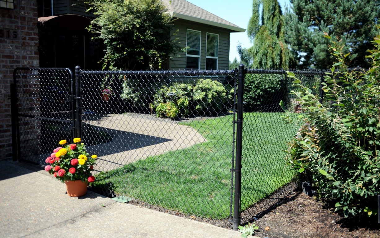 Chain-link fence installation for residential property security in Aiken, South Carolina